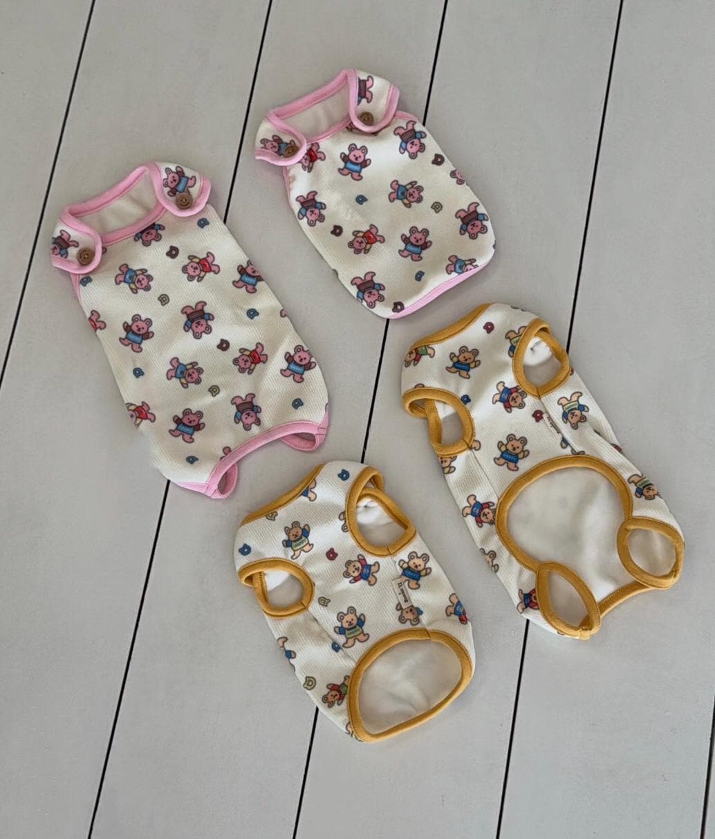 Berry Bear pet outfit overalls and vests in pink and yellow with bear patterns