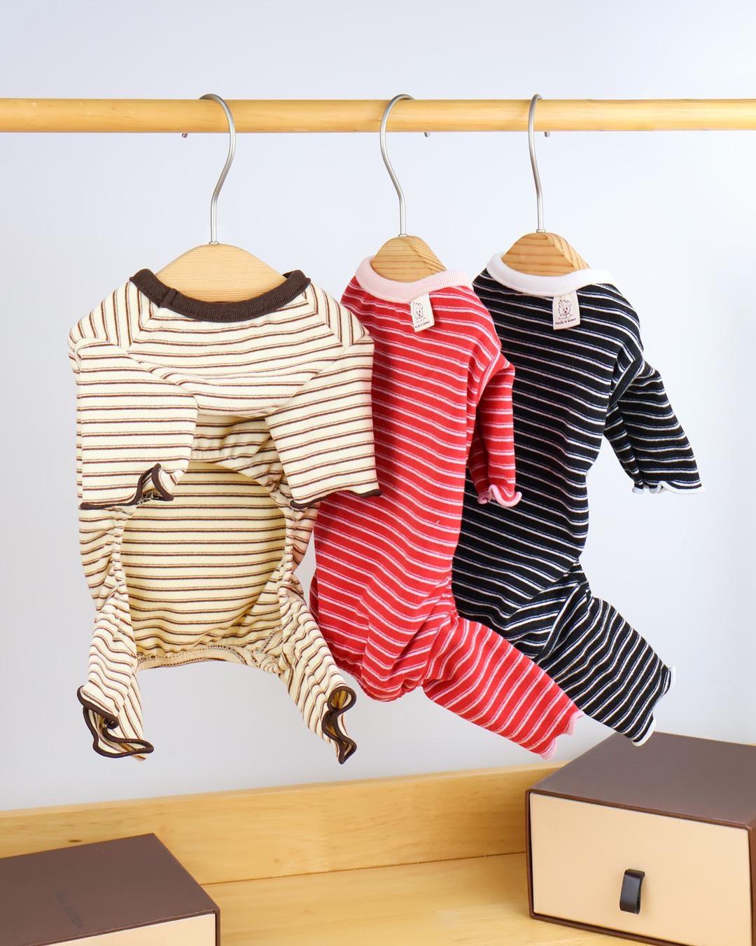 NKpup Everyday Striped Dog Overalls in beige, red, and navy blue.