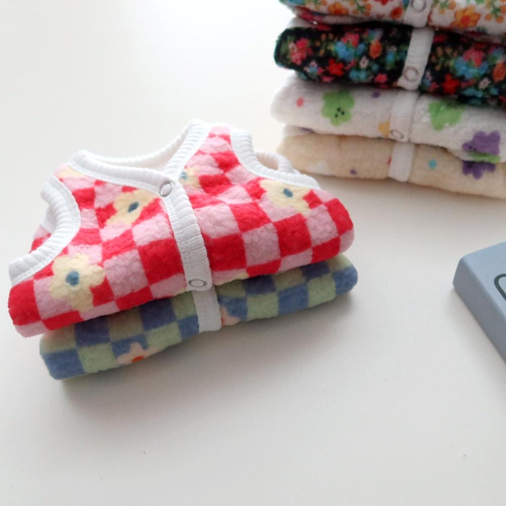 NKpup Check Boa Fleece Dog Vests in red and blue checkered patterns with floral accents.
