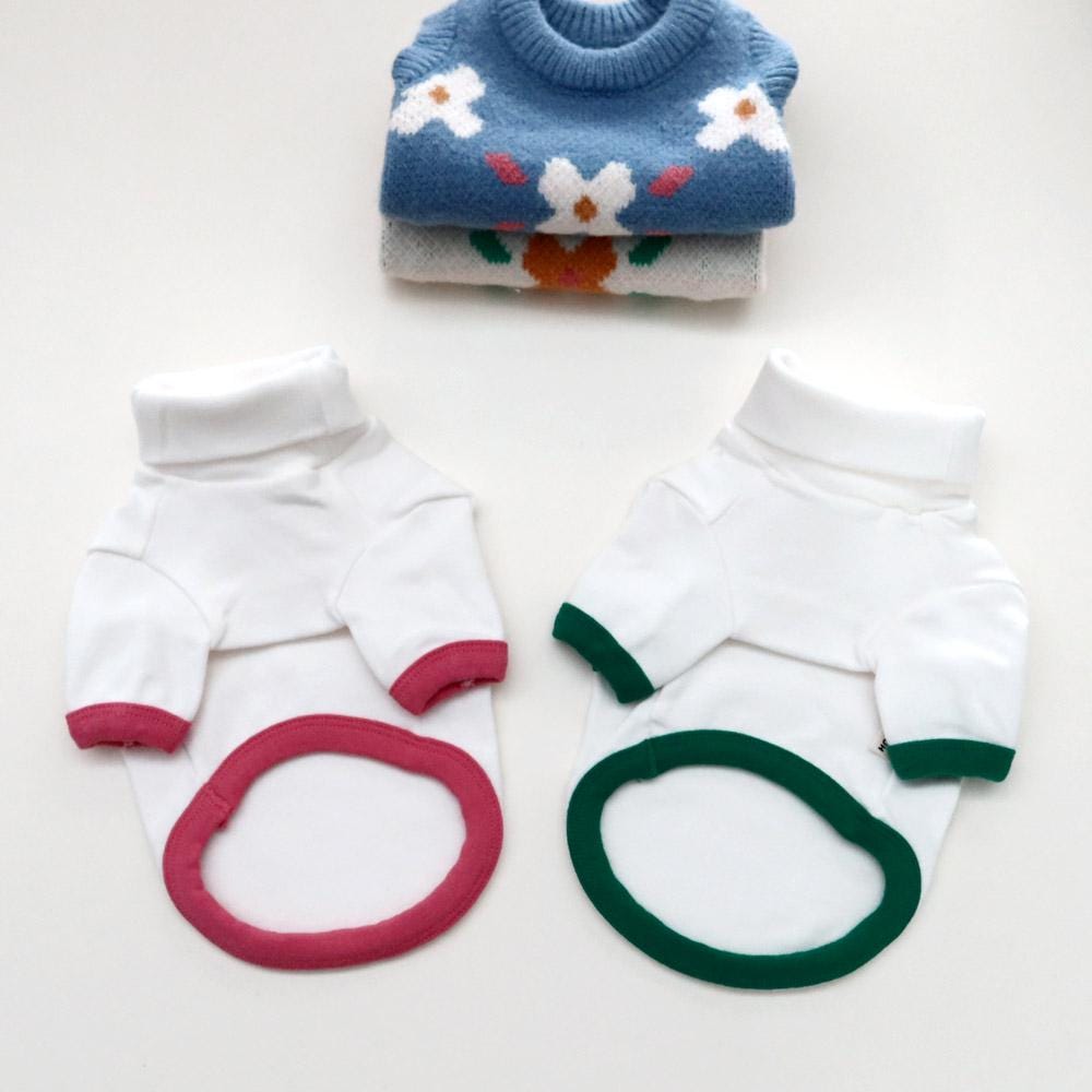 NKpup soft turtleneck dog shirts in white with pink and green trim alongside a blue floral pet sweater