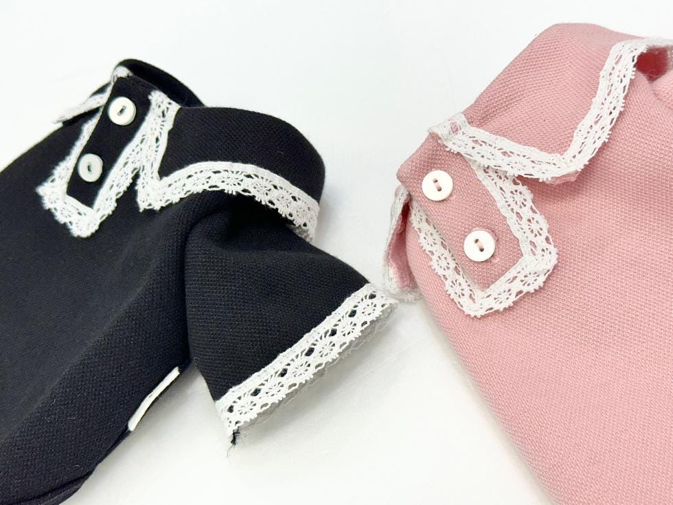 Black and pink Lace Collar Tee dog shirts with white lace trim and button details
