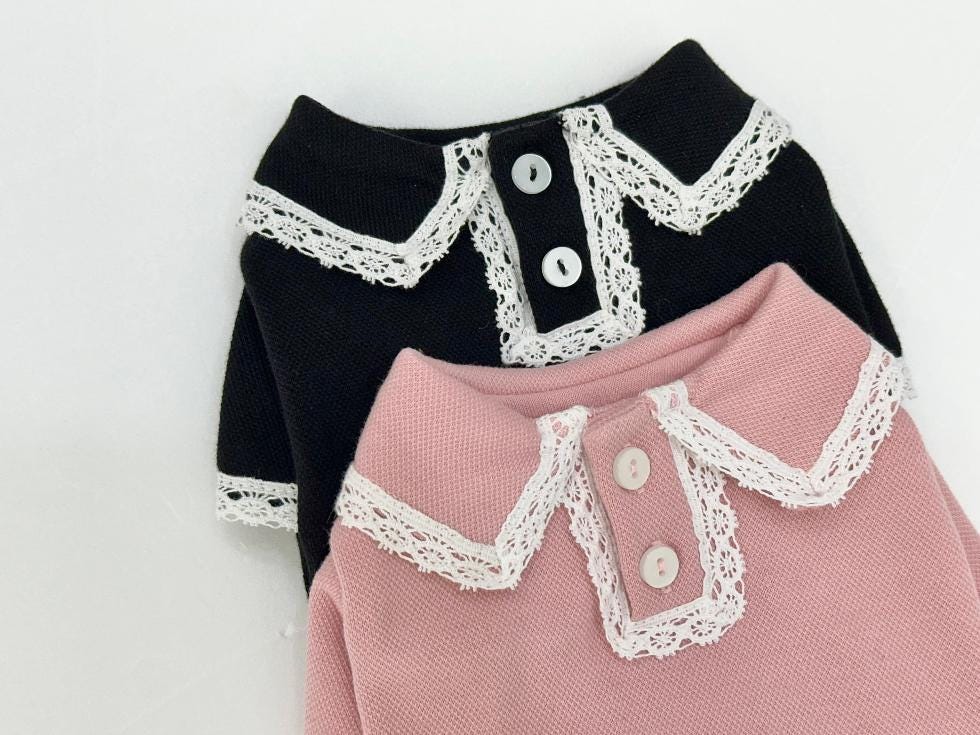 NKpup lace collar tees for pets in black and pink with decorative button details.