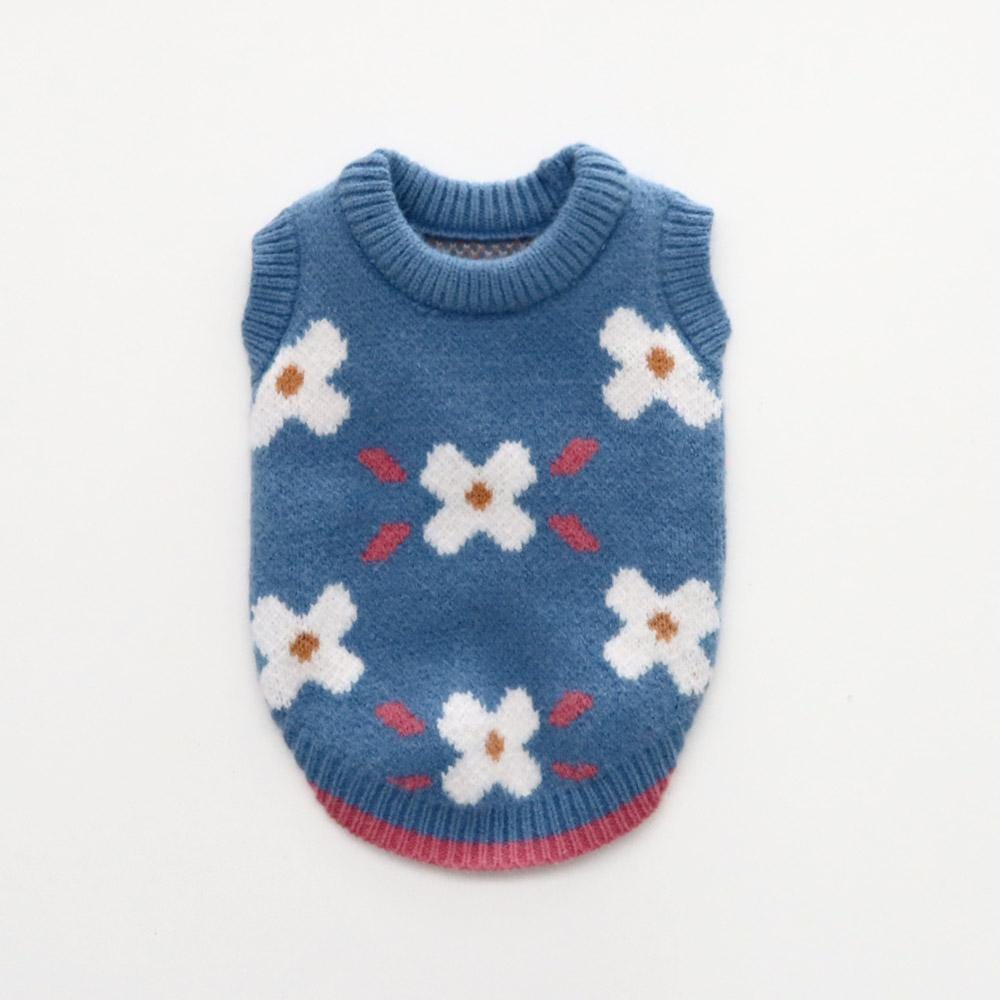 Blue NKpup Daisy Knit Dog Vest with white floral patterns and pink trim