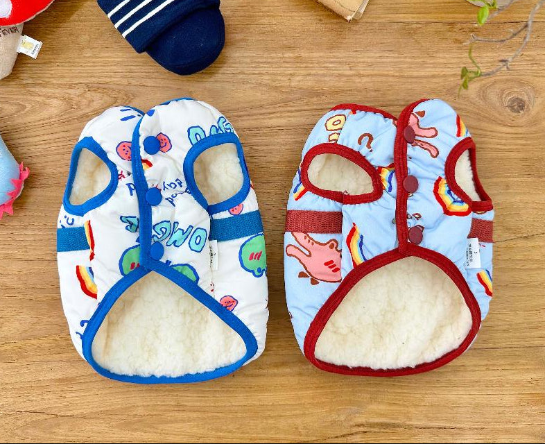 NKpup OMG D-Ring Padded Dog Vests in white and light blue with colorful cartoon patterns.