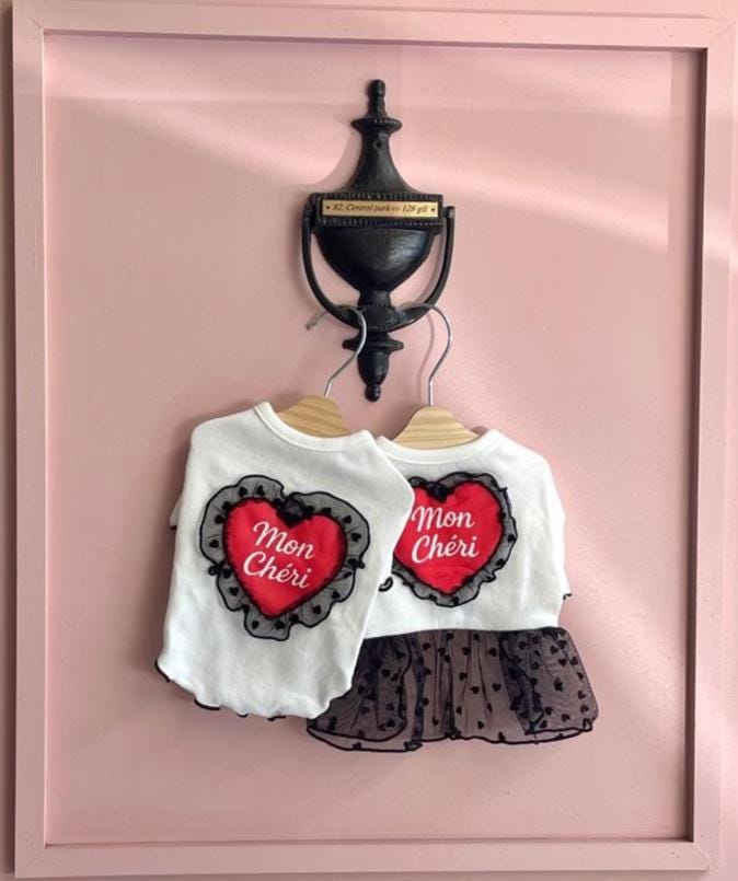 NKpup Mon Cheri white dog shirt and black heart-patterned dog dress with red heart embroidery.