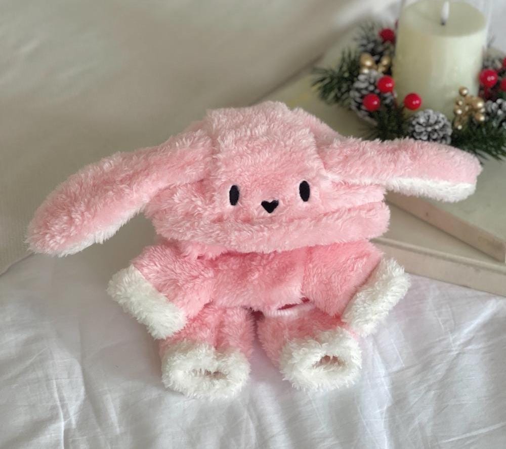Pink Bunny Fleece Overall pet romper with white trim.