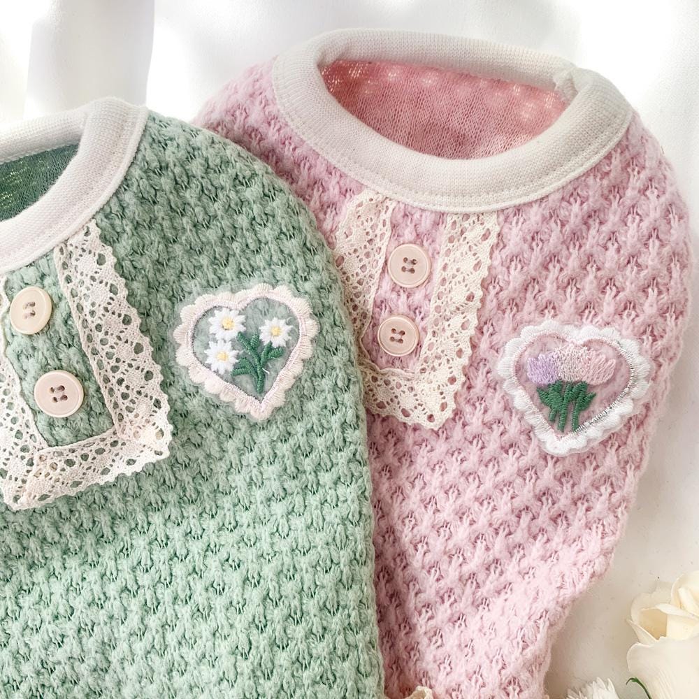 NKpup Garden Knit Dog Vest in mint green and pink with floral heart patches and lace trim.