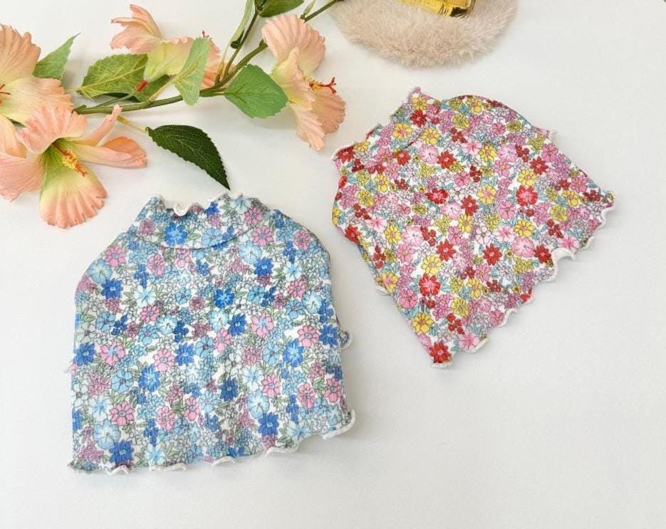 NKpup Floral Garden Crop Tees for dogs in blue and pink floral patterns with lettuce edge hems