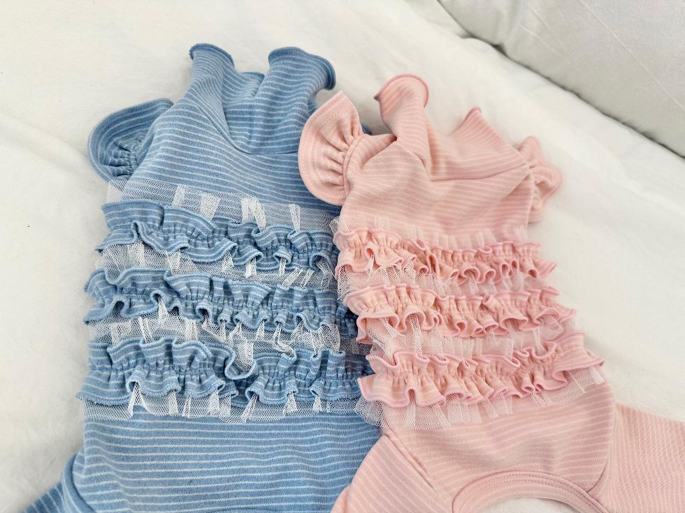 NKpup Ruffle Ribbed Dog Overalls in light blue and pink with tiered mesh ruffles