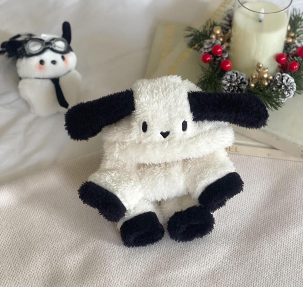 NKpup Bunny Fleece Overall in white and black plush fabric.