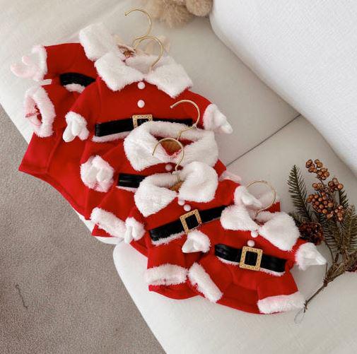 Red Christmas Santa dog costumes with white faux fur trim and black belts