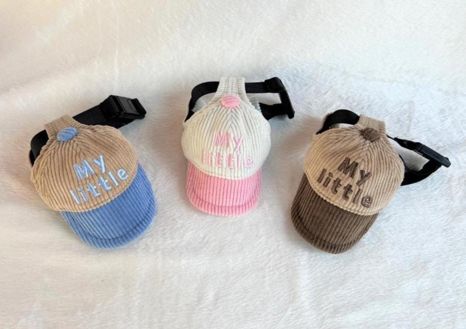 Three NKpup My Little Corduroy Caps for pets in beige and blue, cream and pink, and brown.