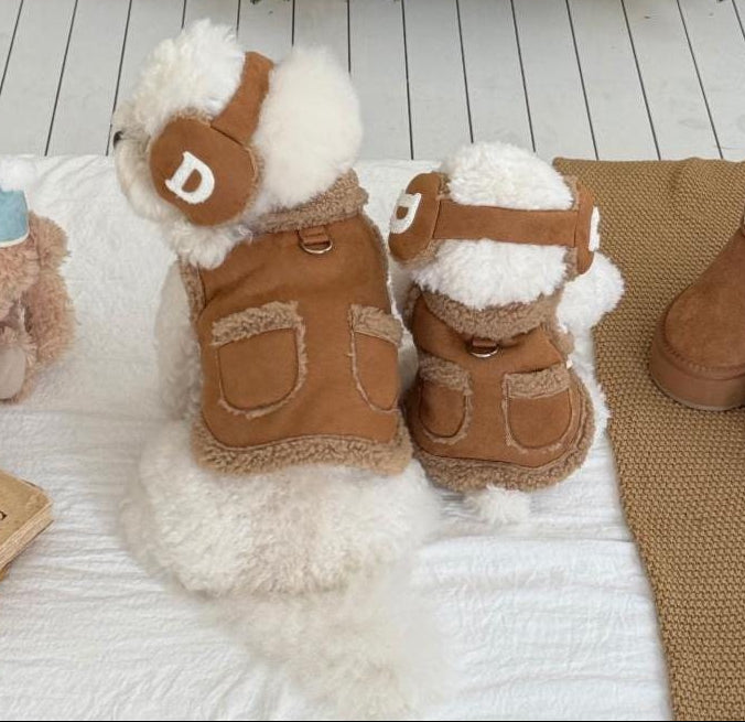 Two dogs wearing NKpup brown Cozy Pocket Shearling Vests with matching headbands