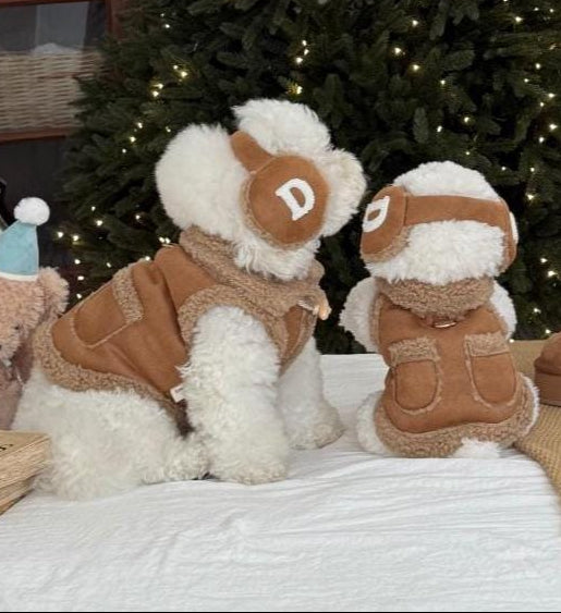NKpup Cozy Pocket Shearling Vest in brown with a front pocket and matching headgear.
