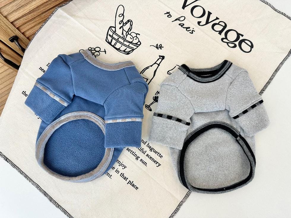 NKpup My Buddy Fleece T-Shirt in blue and grey with striped sleeve details.