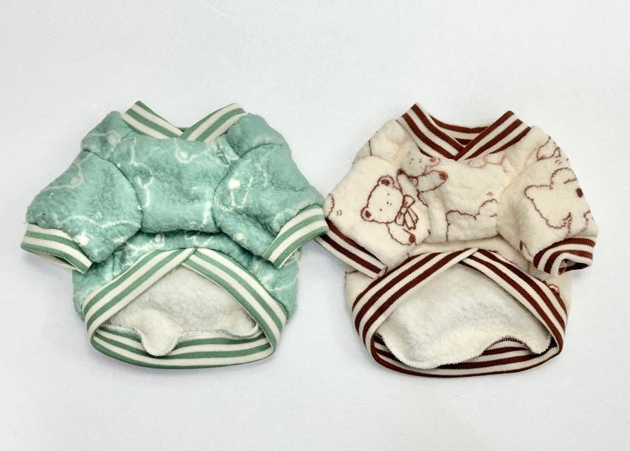 NKpup Ribbon Bear Fleece Dog Sweaters in mint green and cream with bear patterns.