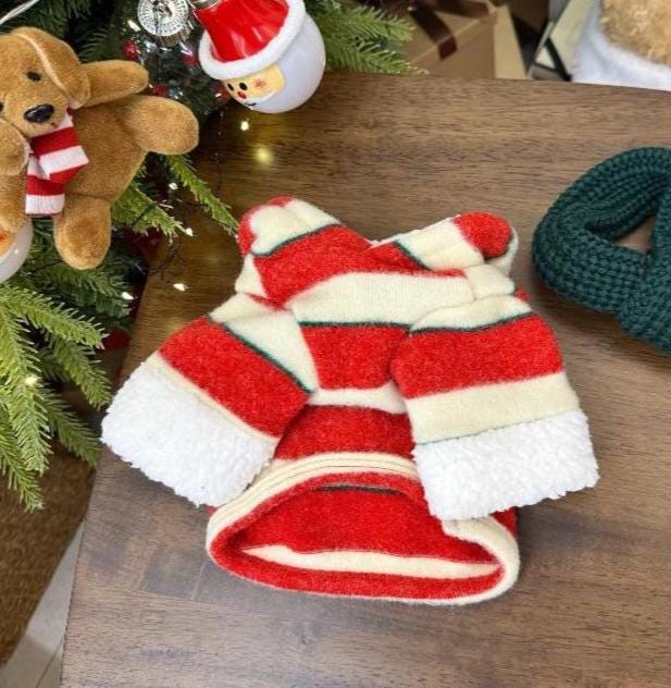 Red and white striped Christmas bow dog shirt with fuzzy white trim