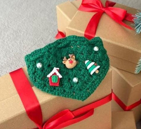 Green crochet Christmas dog cape and hat set with reindeer and tree ornaments