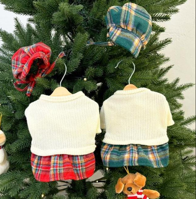 Holiday plaid knit dog dress and hat set in red and green patterns.