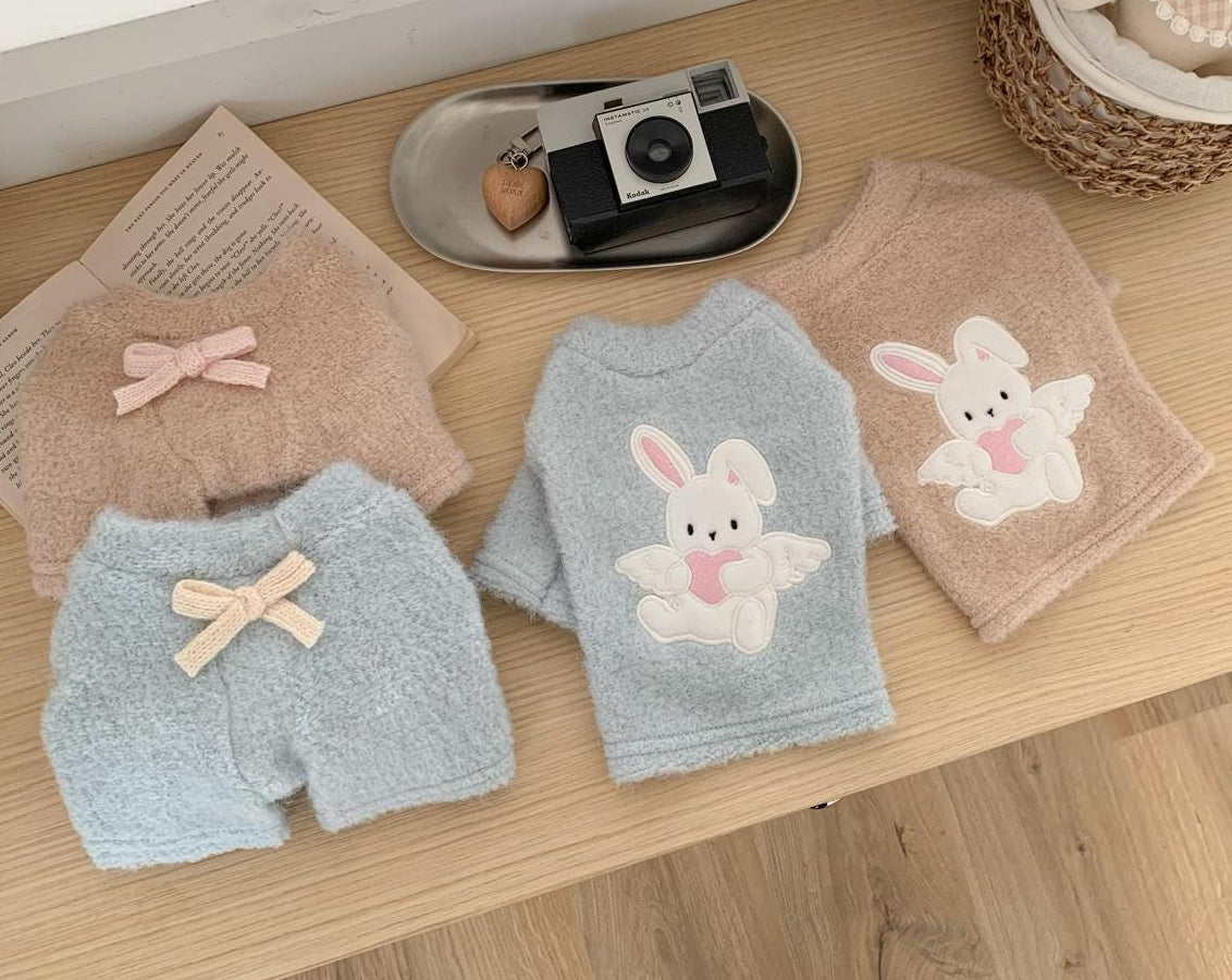 Angel Bunny Knit Dog Sweater in light blue and beige with bunny embroidery and bow details.