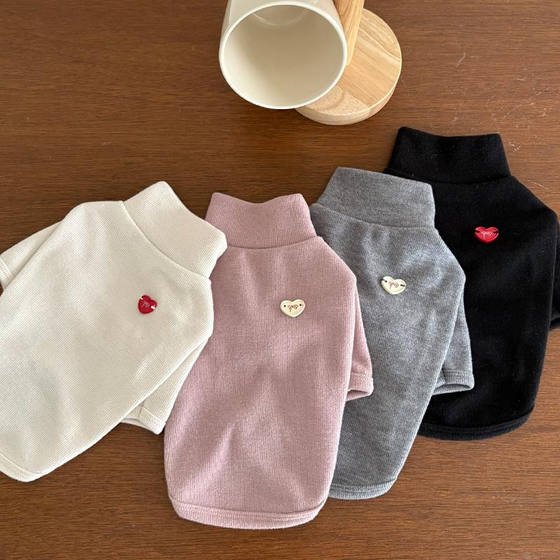 Four NKpup heart solid dog turtleneck shirts in white, pink, grey, and black.