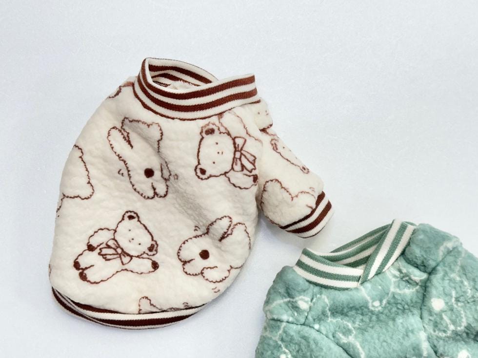 NKpup Ribbon Bear Fleece Dog Sweater in cream with brown bear patterns and striped trim