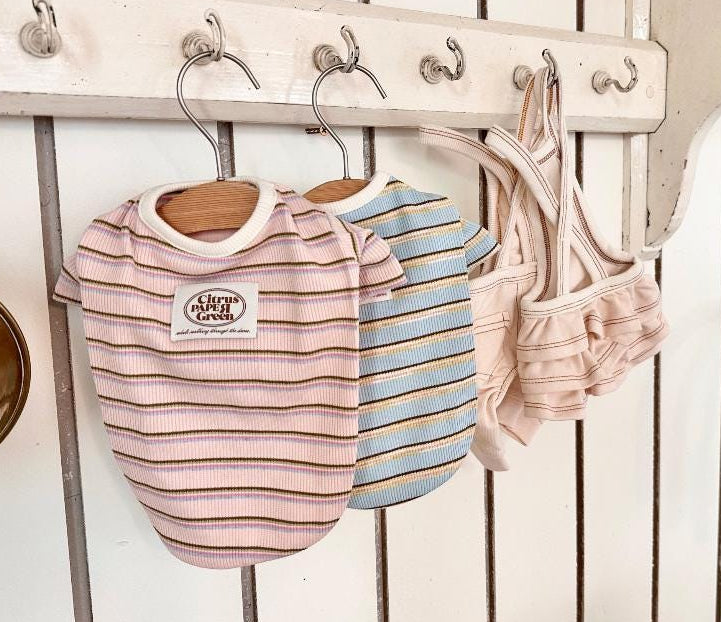 NKpup Paper Stripe Ribbed Dog Shirts in pink and blue striped patterns.