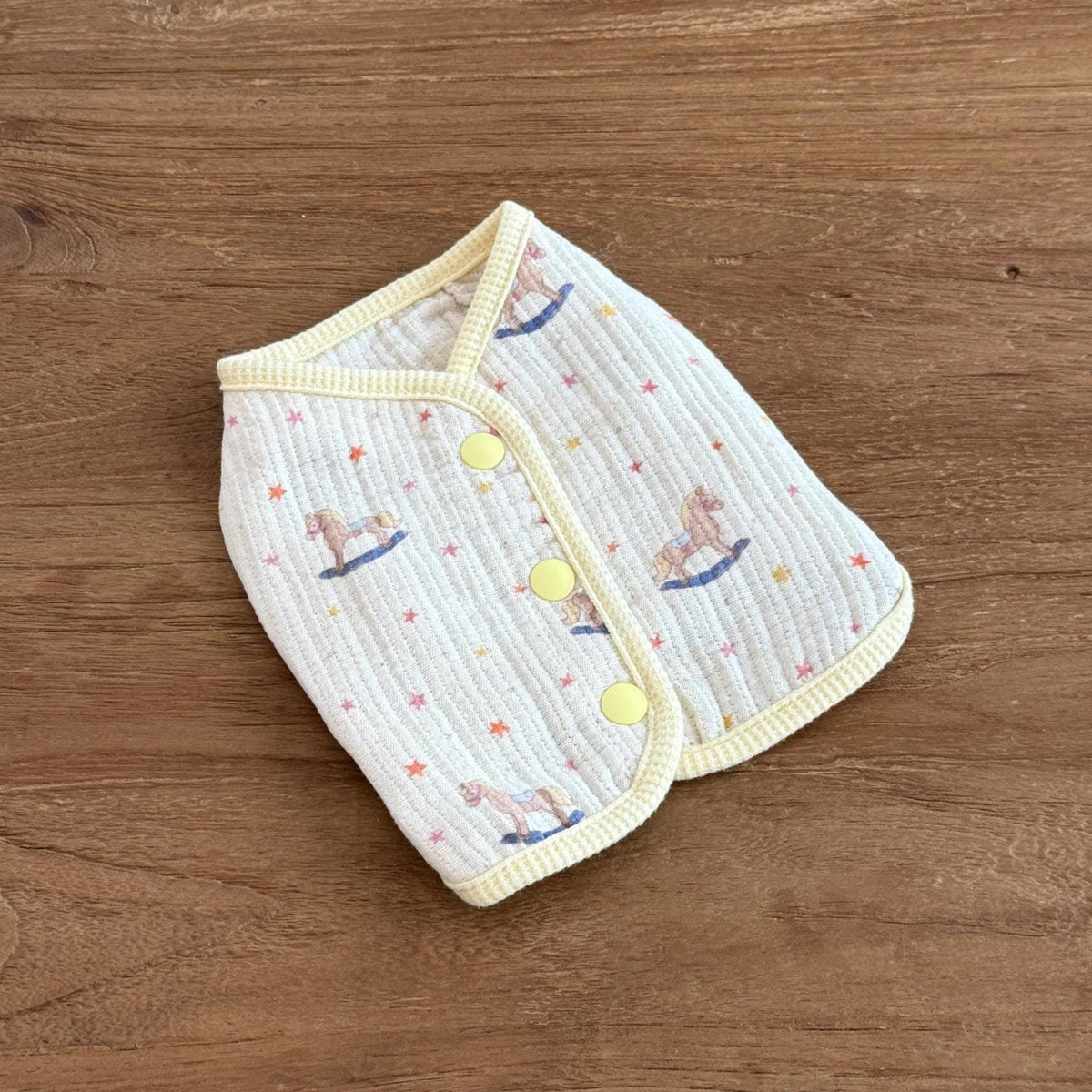NKpup Pony&Lamb Dog Vest in cream with rocking horse pattern and yellow buttons