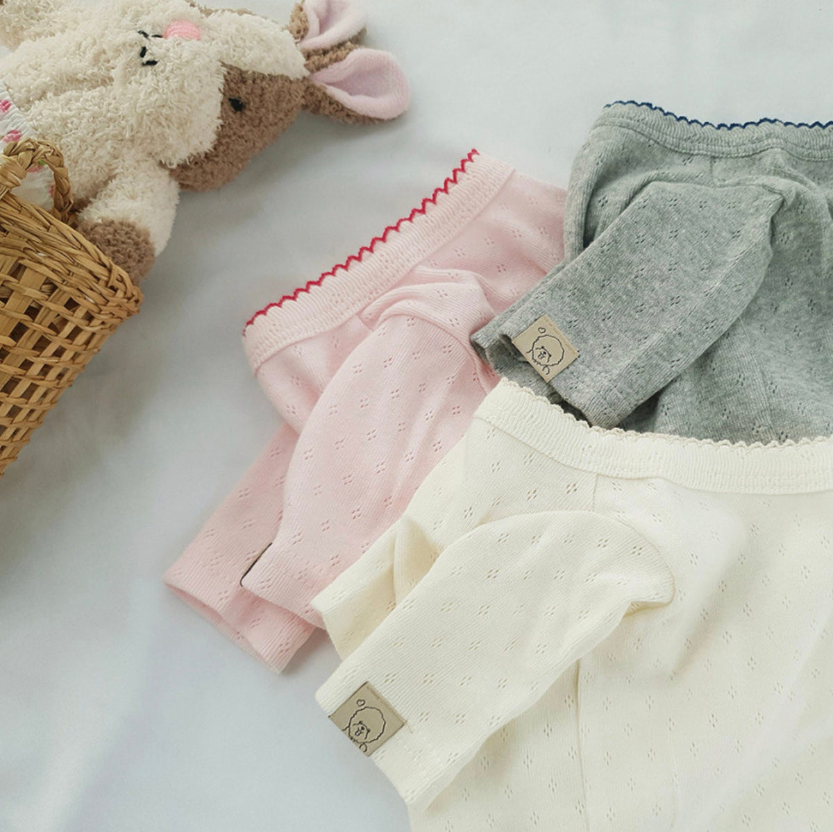 NKpup Basic Ribbed Dog Shirts in pink, grey, and cream colors.