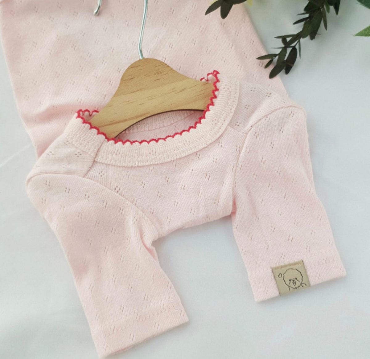 NKpup Basic Ribbed Dog Shirt in light pink with scalloped red trim