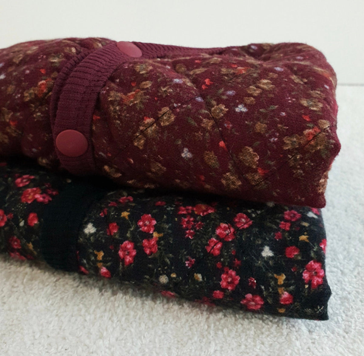 NKpup vintage quilted floral dog vests in burgundy and black patterns.
