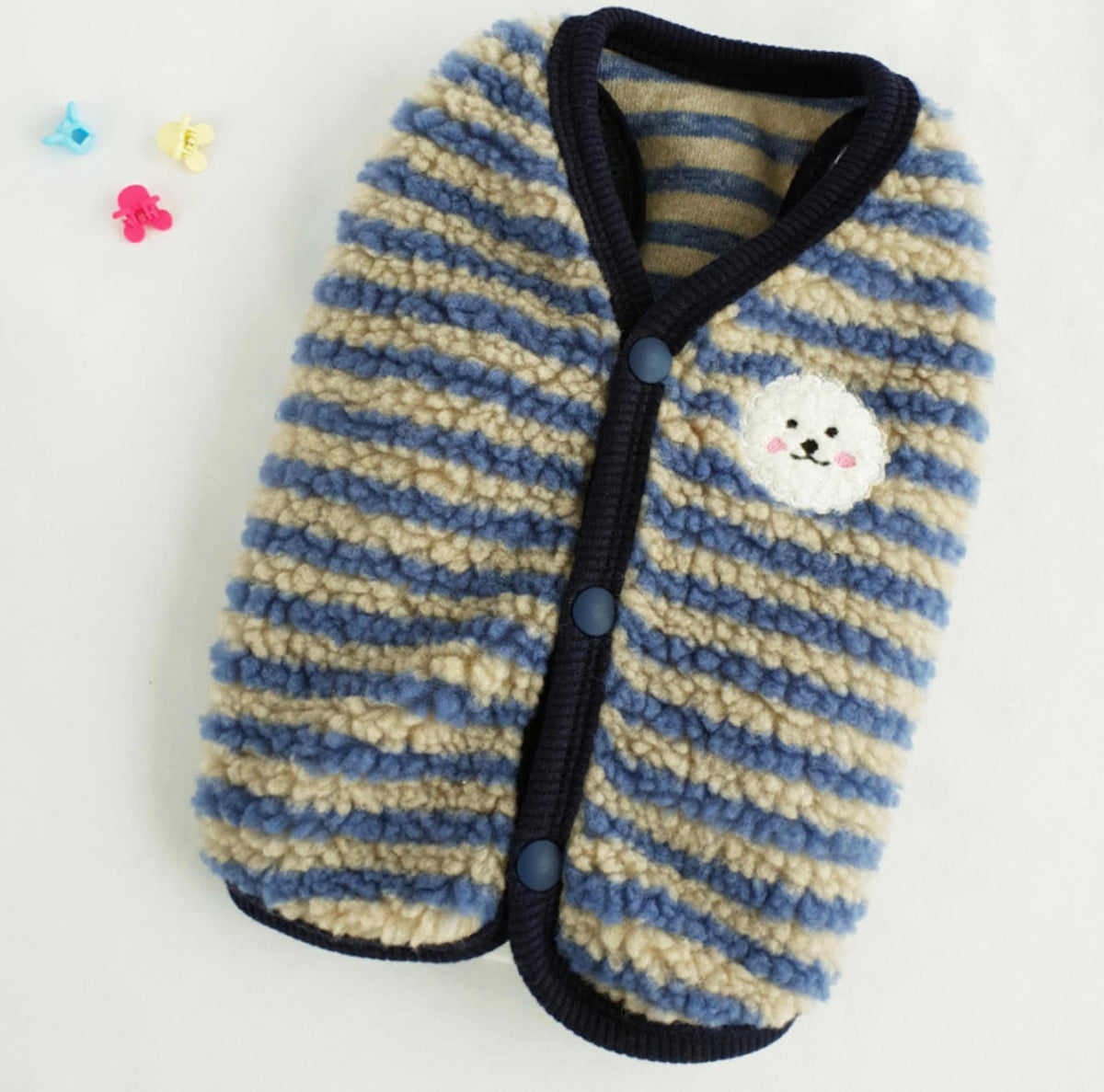 NKpup blue and beige striped fleece dog vest with a white puppy patch