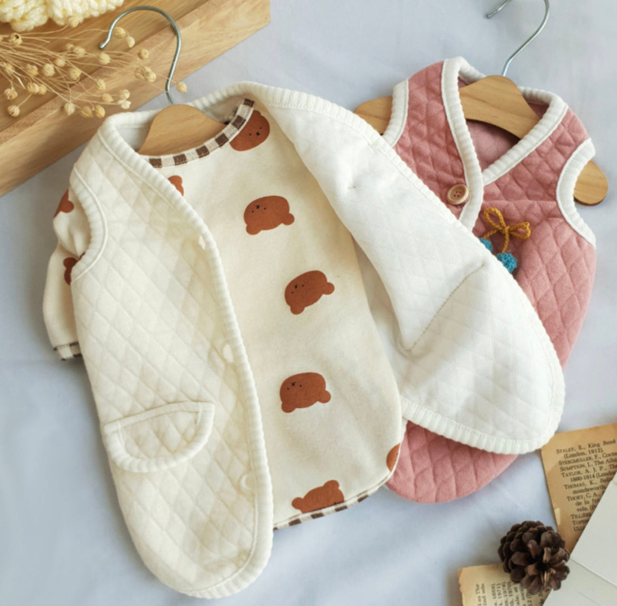 NKpup Cherry Quilted Dog Vests in cream with bear pattern and dusty pink.