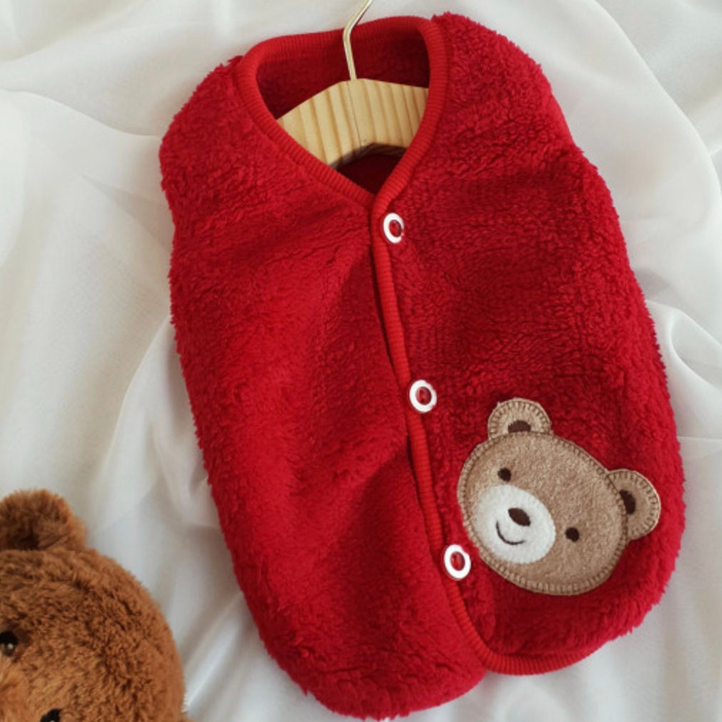 Red teddy fleece dog vest with a cute bear patch detail