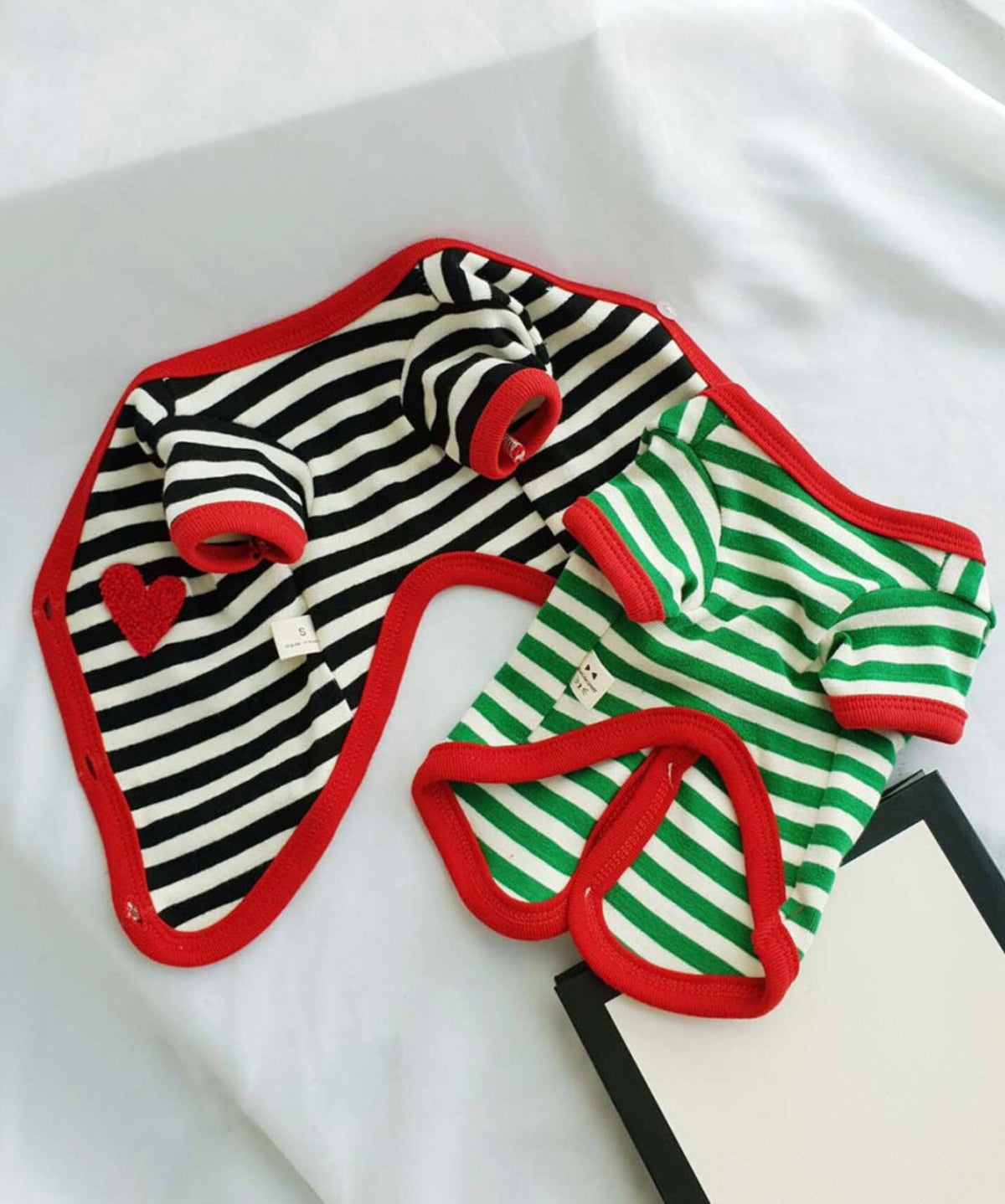 NKpup Heart Stripe Dog Cardigan in black and white and green and white striped patterns.