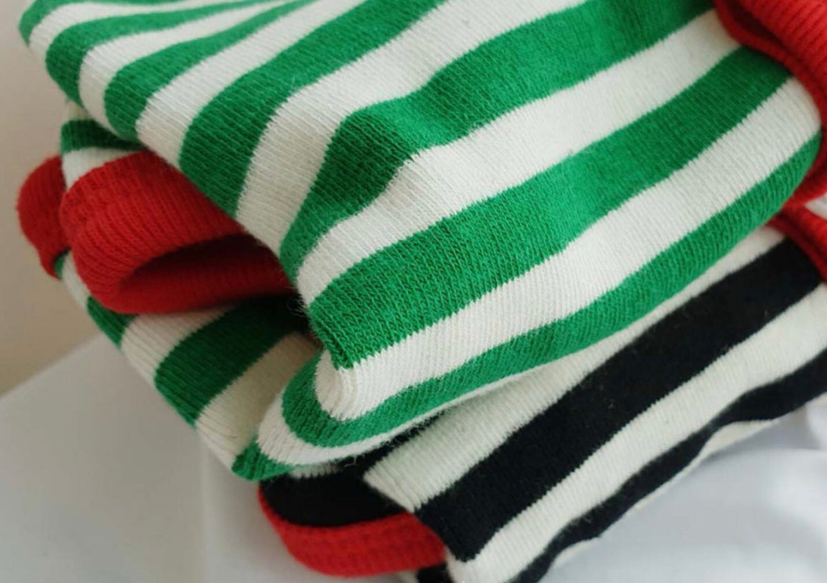 NKpup Heart Stripe Dog Cardigan in green, white, and black striped patterns