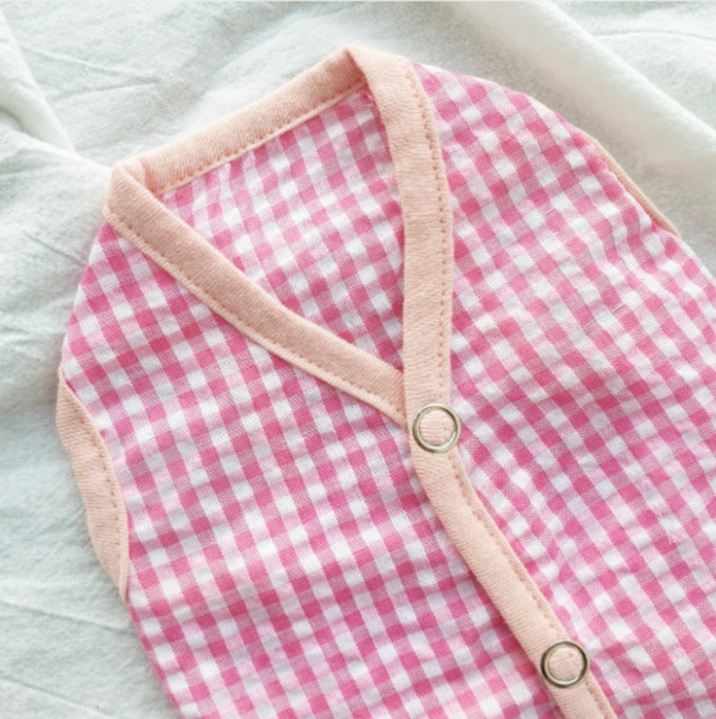 NKpup vintage-inspired pink and white gingham dog vest with light pink trim and button closures