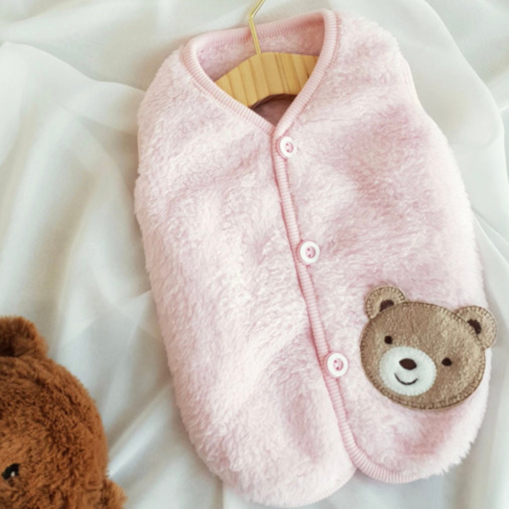 Pink teddy fleece dog vest with a cute bear patch detail by NKpup
