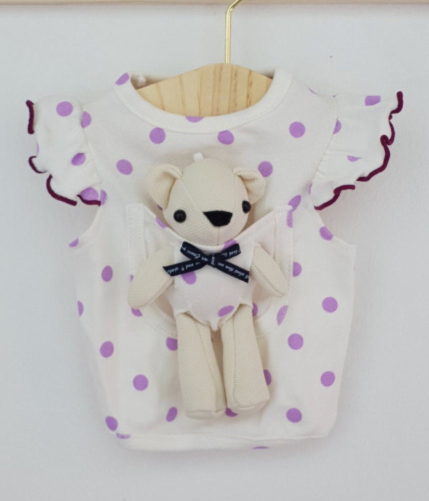 NKpup white dog shirt with purple polka dots and a teddy bear in the front pocket