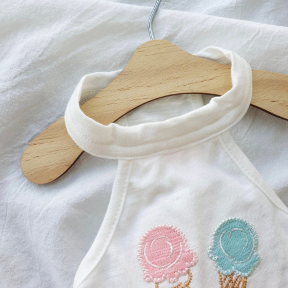 White NKpup dog crop tank top featuring pink and blue ice cream cone embroidery