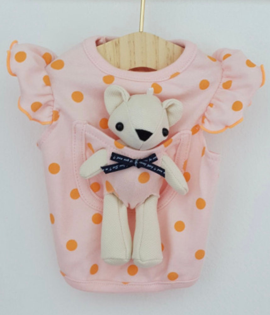 NKpup pink polka dot dog shirt with ruffle sleeves and a teddy bear in the pocket
