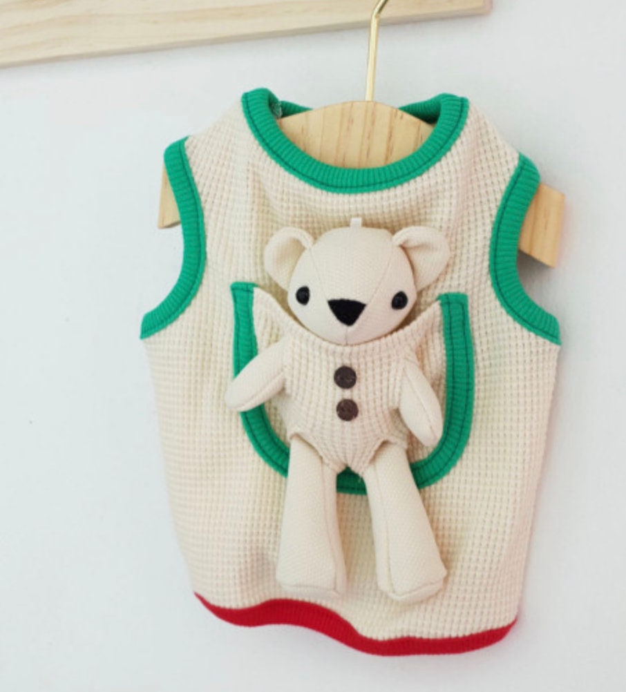 NKpup plush teddy bear dog tank top in cream with green trim and a teddy bear pocket detail