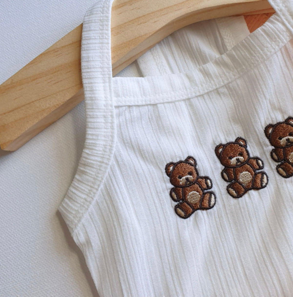 White NKpup Animal Garden dog crop tank top with three brown bear embroidery designs.