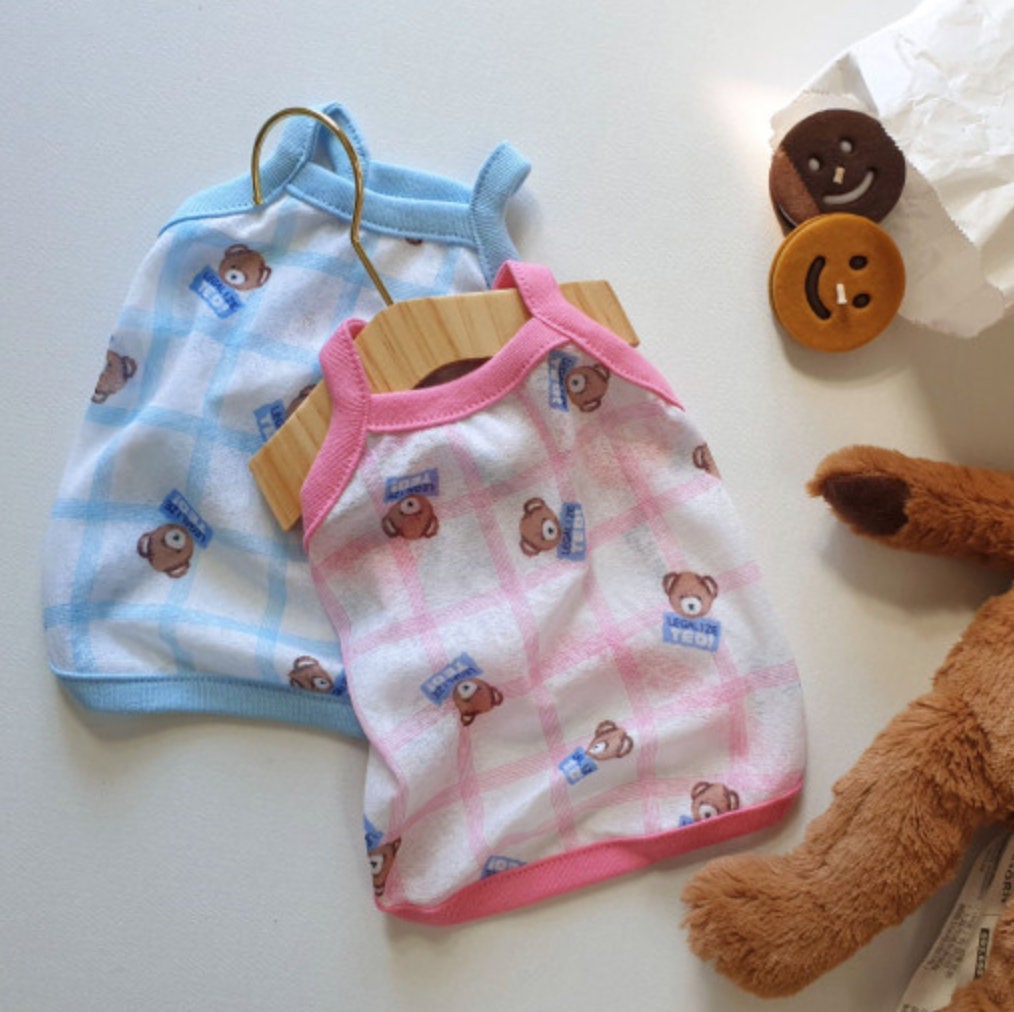 Two NKpup teddy bear pattern dog tank tops in light blue and pink plaid.