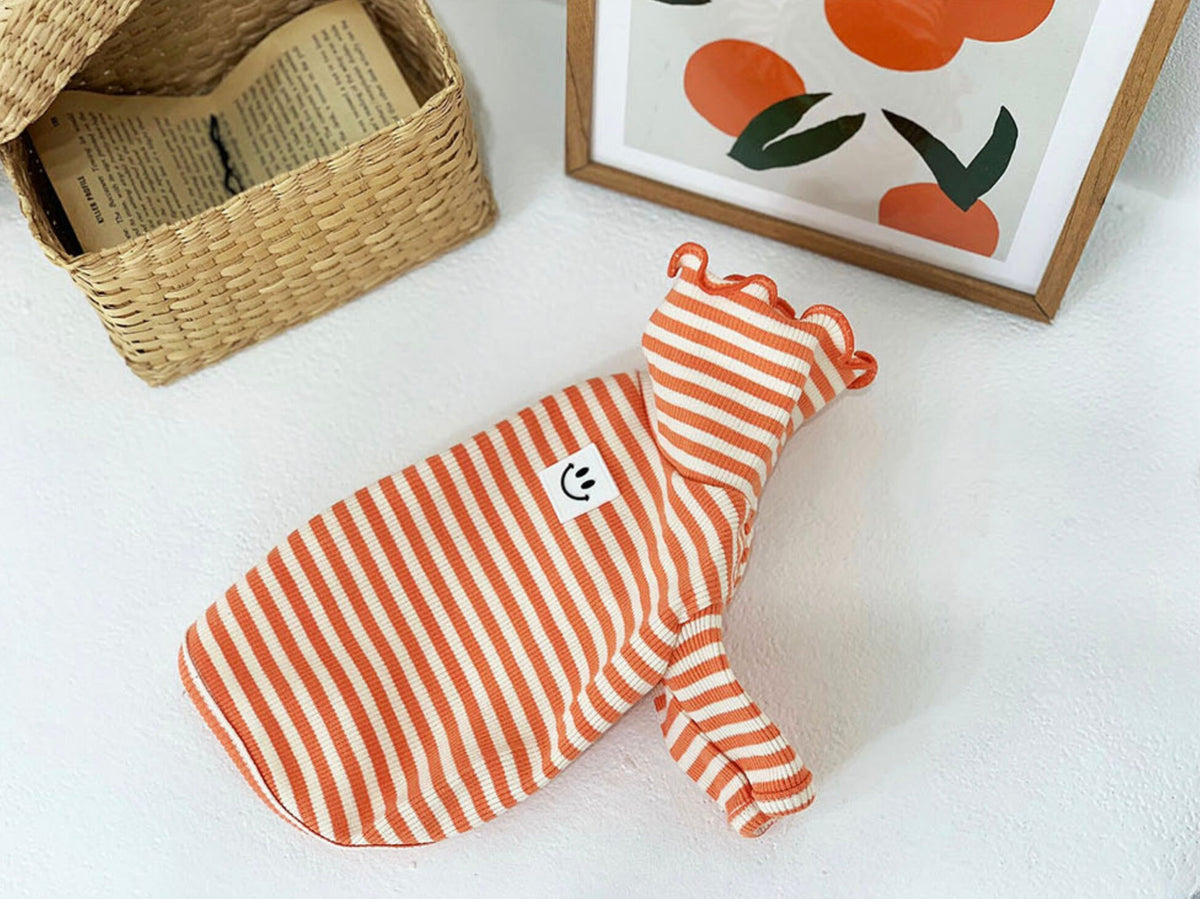 Willy Stripe Dog Turtleneck Shirt in orange and white stripes with a smiley face patch by NKpup