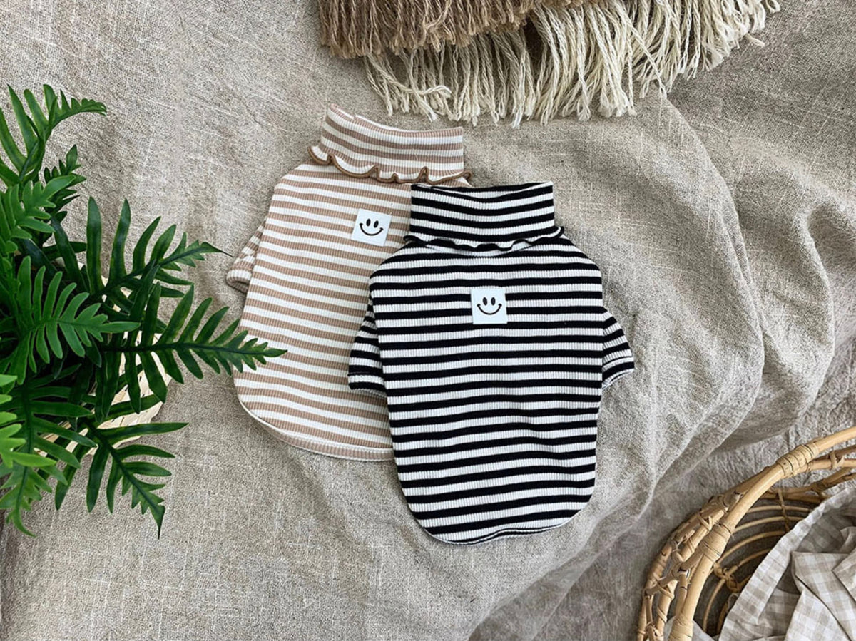 Willy Stripe Dog Turtleneck Shirts in black and beige with smiley face patches.