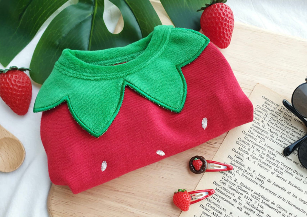 Halloween strawberry fleece dog shirt with green leaf collar and white seed pattern