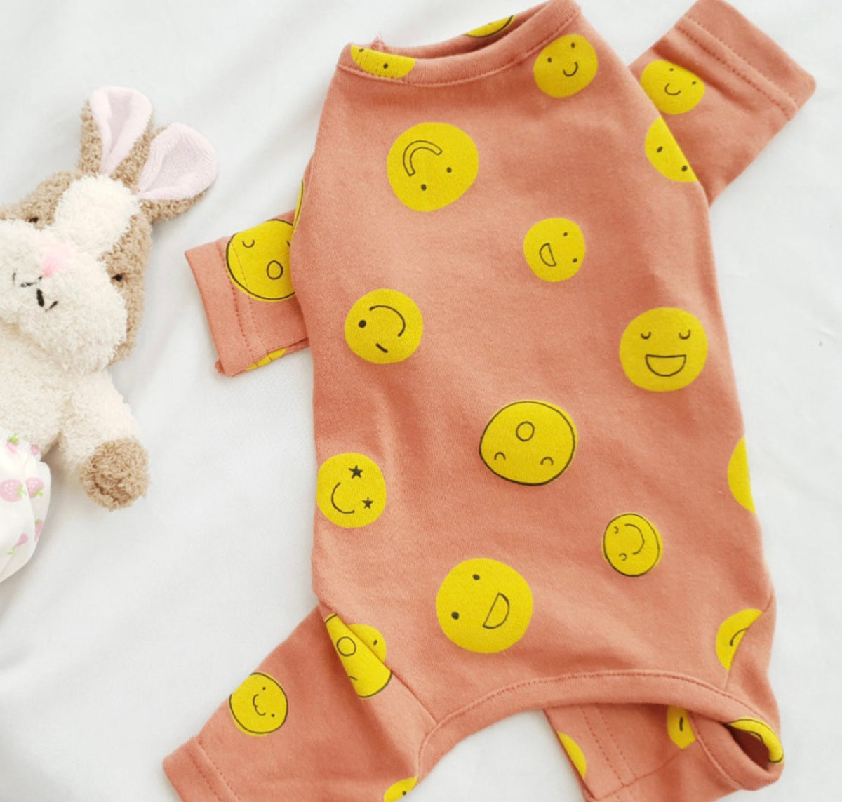 NKpup smile face dog overall in peach color with yellow smiley patterns