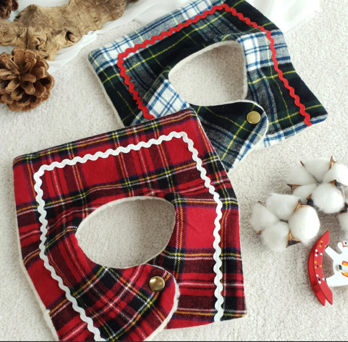 NKpup reversible plaid dog cape in red and blue check patterns with scalloped trim