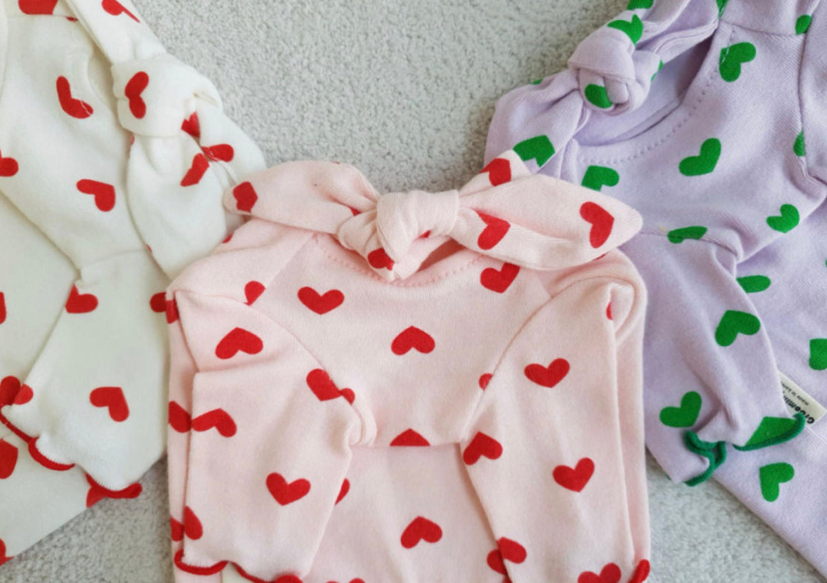 NKpup Heart Tie Dog Shirts in white with red hearts, pink with red hearts, and lavender with green hearts
